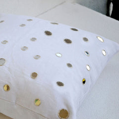 Decorative throw pillows in linen with mirrors