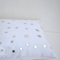 Decorative throw pillows in linen with mirrors
